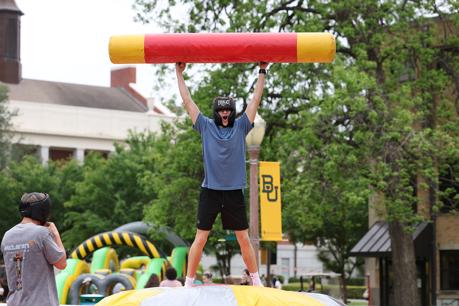 A Baylor Student celebrating a win on King of the Hill